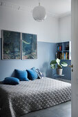 Blue and grey bedroom with two-tone walls