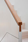 Modern wooden staircase handrail