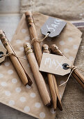 Name tags on bamboo pegs