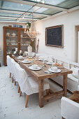 Set table in shabby-chic dining room