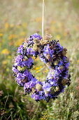 Wreath of purple hydrangeas and blackcurrants