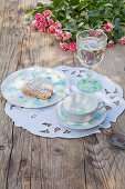 Crockery decorated with stamp print on embroidered doily