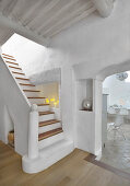Masonry staircase in white Mediterranean house