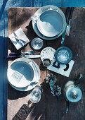 Top view of rustic place setting with knick-knacks