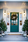 Festively decorated entrance area and front door