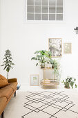 Houseplants on vintage-style plant stand