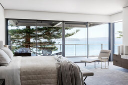 Elegant bedroom with panoramic sea views