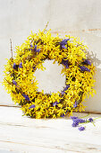 Spring wreath of forsythia and hyacinth florets
