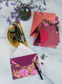 Homemade envelopes made from colourful paper