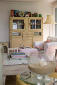 Yellow shabby-chic dresser in romantic living room