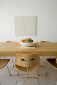 Pale wooden dining table and chairs
