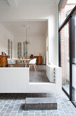 Floating dining area in modernised period building