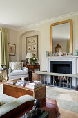 Elegant drawing room with fireplace, fender and rug