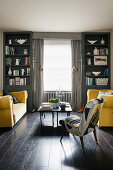 Two yellow sofas in grey and black living room
