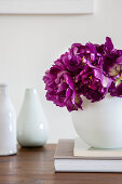 'Purple peony' tulips in white spherical vase