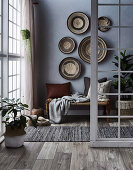 Basket bowls on the gray wall above the bench with pillows