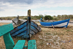 Colourful old boats on beach