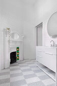 White bathroom with open fireplace and checkerboard floor