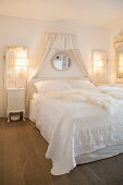 Vintage-style bedroom decorated entirely in white