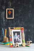 Photo of child on first day of school in hand-crafted picture frame