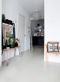 White floor and vintage accessories in foyer