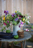 Summer bouquet of sweet peas, marigolds, dill flowers, and asters