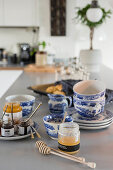 Preserves, honey and crockery with classic blue pattern