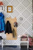Handmade, plywood children's coat rack with mountain motif
