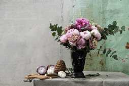 Bouquet of peonies and eucalyptus