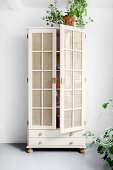Refurbished cupboard with Viennese cane door panels