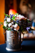 Bouquet with cotton bolls in silver tankard