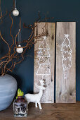 Christmas pictures drawn on wooden boards