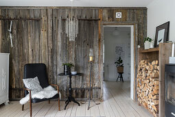 Country-house-style dining room with rustic board wall