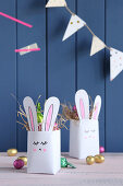 Handmade Easter nests with bunny motif made from recycled tetrapacks