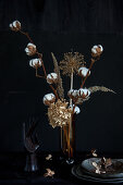 Dried-flower arrangement of cotton bolls, hydrangea, allium