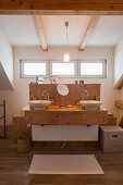 Twin sinks on wooden washstand in modern, country-house-style bathroom