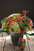 Bouquet of trachelium, rose hips and ornamental cabbage