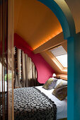 Double bed in Moroccan-inspired bedroom