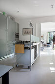 Industrial-style island counter in modern masculine kitchen