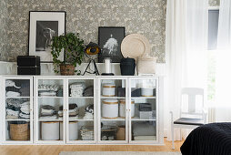 Linen cupboard made of old windows in the bedroom