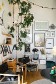 Gallery of pictures in living room in Scandinavian vintage style