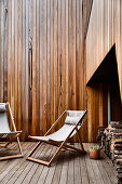 Deckchairs on wooden terrace