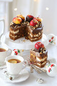 Christmas cake with apples and a cup of tea
