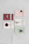 DIY place cards with washi tape and dried flowers