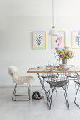 Dining table with classic chairs in a bright room