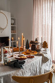 Christmas table in the dining room in grey tones