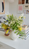 A summer bouquet with feverfew and silver acacia