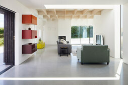 Living area with colorful shelves in the extension