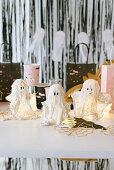 DIY ghosts made out of plaster for Halloween