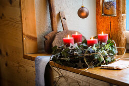 Advent wreath made from natural materials on a windowsill